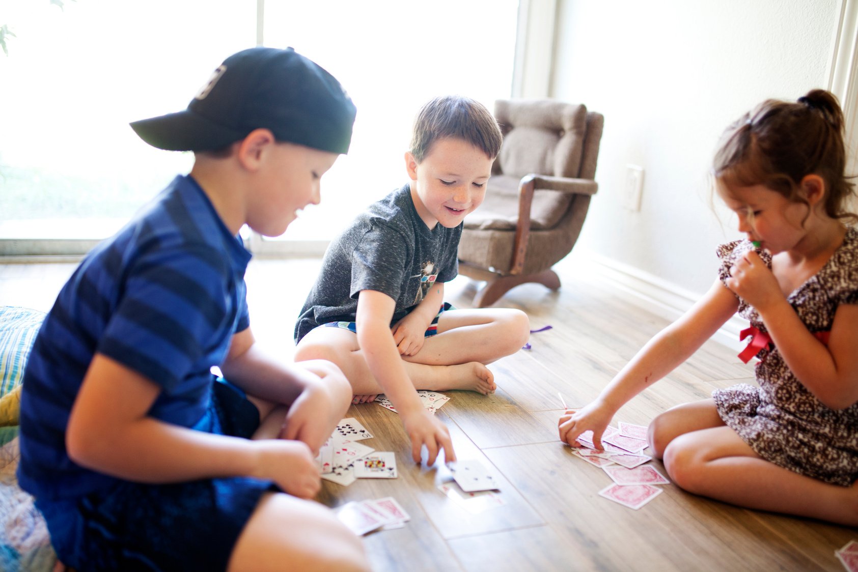 Young Kids Playing Cards